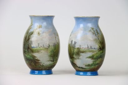 LEGRAND, Paire de vases à décor tournant...