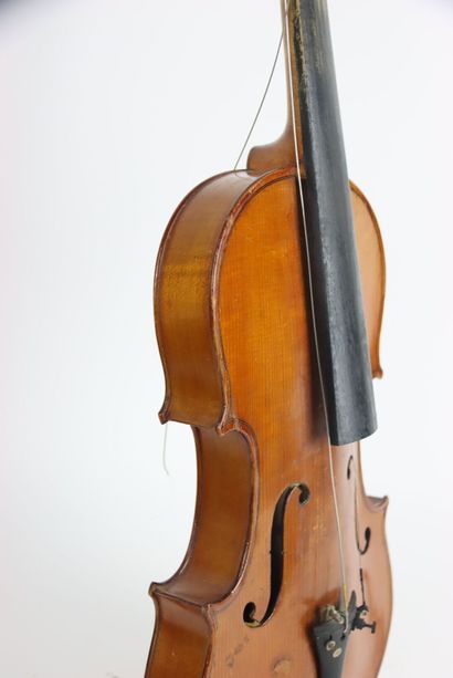 Study violin in its case. A bow is attached...