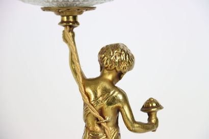 Pair of gilt bronze lamps, the shaft formed...