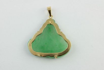 Green hard stone pendant with a smiling Buddha,...