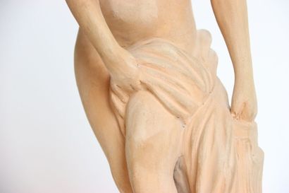 Large terracotta statue of a young woman...