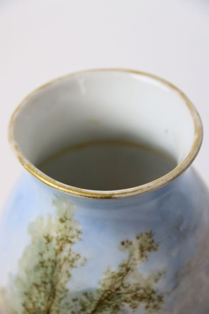 LEGRAND, Paire de vases à décor tournant...