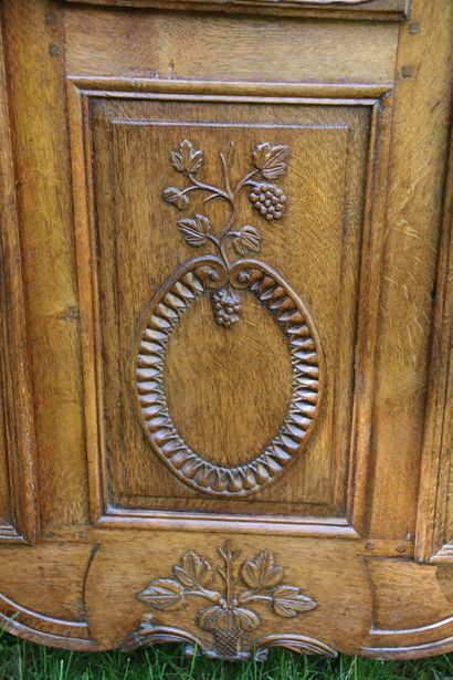 Buffet in molded and carved oak opening by...