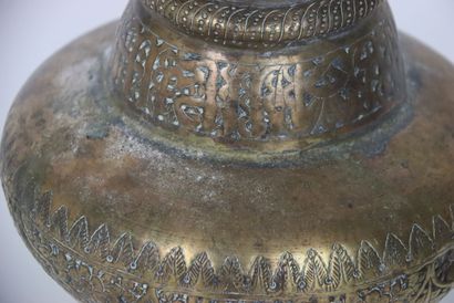 PERSIA, XIXth century. Pique-cierge in chased...