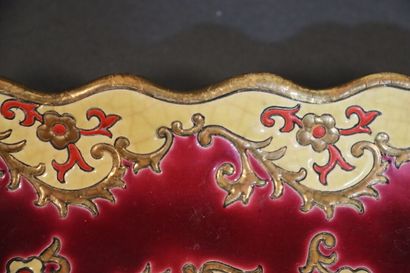 LONGWY. Dish in enamelled and cracked earthenware...