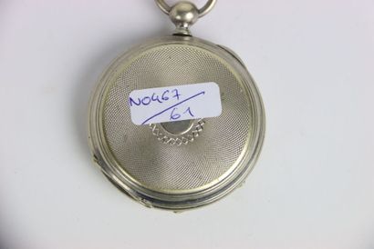 Pocket watch in metal with its key. Dial...