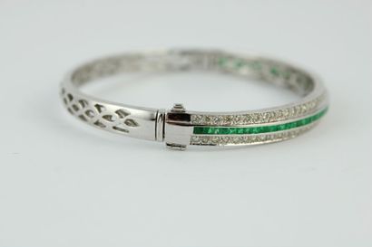 Bracelet jonc en or gris 18K (750/1000) orné...
