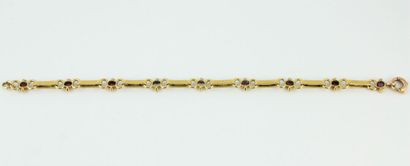 18K (750/1000) yellow gold articulated bracelet...