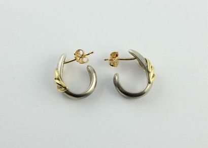 Pair of 18K (750/100) gold and silver (900/1000)...