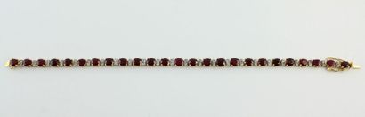 Bracelet en or jaune 18K (750/1000) orné...