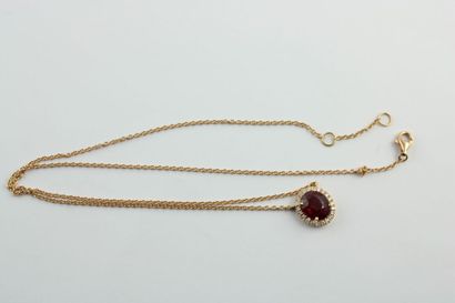 Collier en or rose 18K (750/1000)) centré...