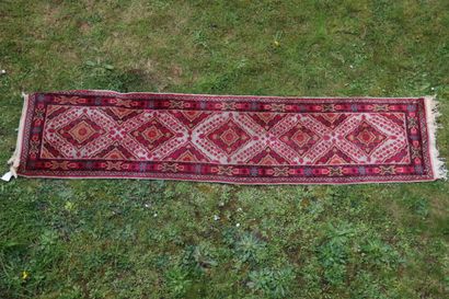 Tapis. Galerie Samarkande ( sinkiang). Frontière...