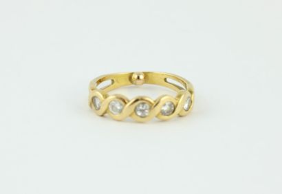 Bague en or jaune 18K (750/1000) ornée de...