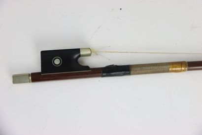 Study violin in its case. A bow is attached...