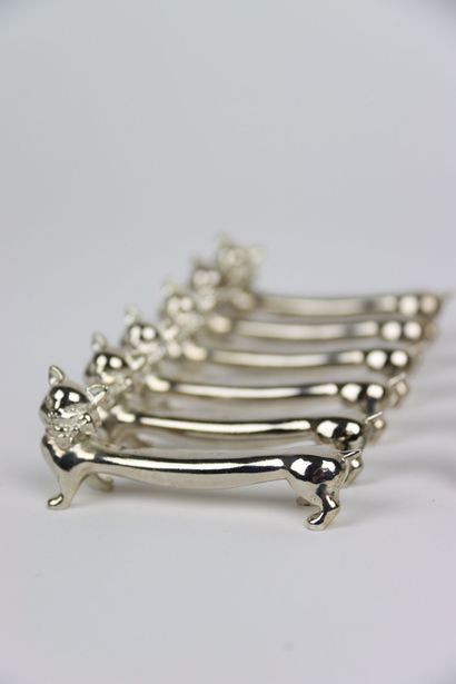 Meeting of twelve cat knife holders in silver...