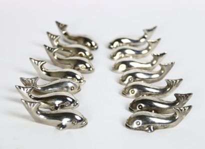 Meeting of twelve silver plated knife holders...