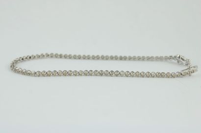 Bracelet en or gris 18K (750/1000) souple...
