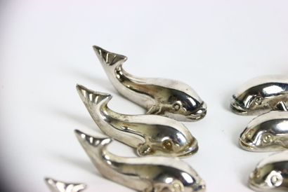 Meeting of twelve silver plated knife holders...