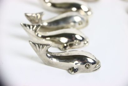 Meeting of twelve silver plated knife holders...