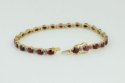 Bracelet en or jaune 18K (750/1000) orné...