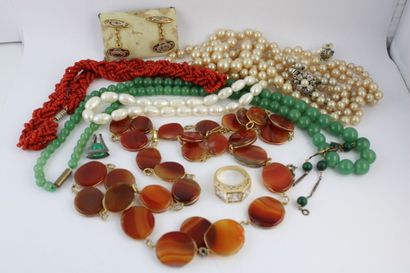 Lot of costume jewelry including: a gold...