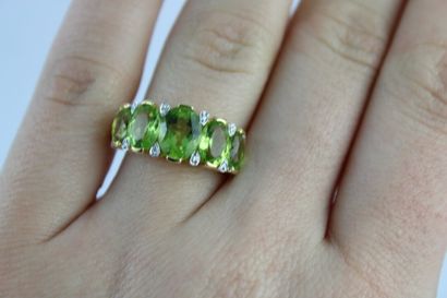 Bague jarretière en or jaune 18K (750/1000)...