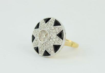 Bague en or jaune et gris 18K (750/1000)...