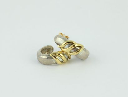 Pair of 18K (750/100) gold and silver (900/1000)...
