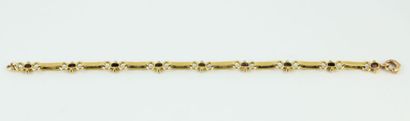 18K (750/1000) yellow gold articulated bracelet...