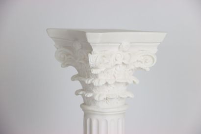 Fluted column on pedestal in the Greek style,...