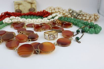 Lot of costume jewelry including: a gold...