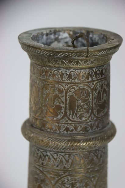 PERSIA, XIXth century. Pique-cierge in chased...
