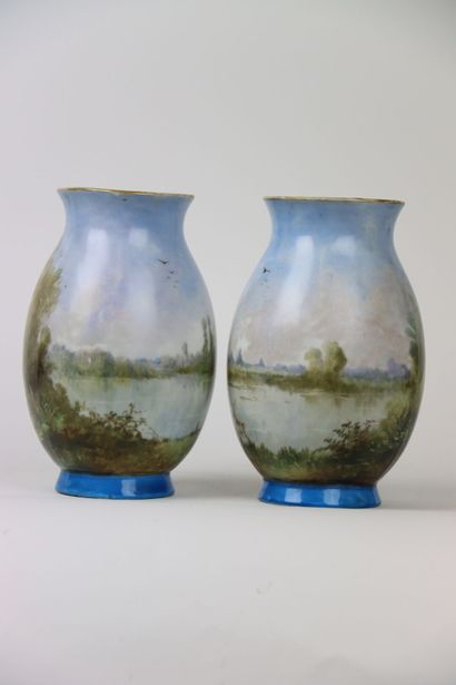 LEGRAND, Paire de vases à décor tournant...
