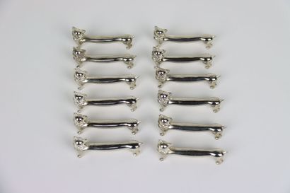 Meeting of twelve cat knife holders in silver...