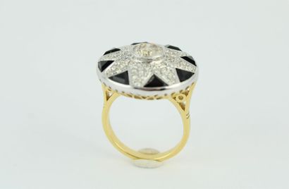 Bague en or jaune et gris 18K (750/1000)...