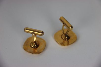 Pair of gold plated cufflinks in its case....