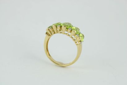 Bague jarretière en or jaune 18K (750/1000)...