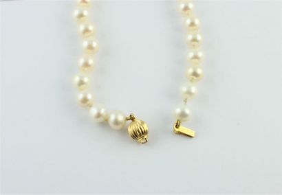 Necklace decorated with cultured pearl, the...