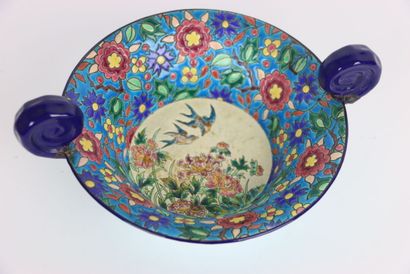 LONGWY. Basket in polychrome enamelled earthenware...