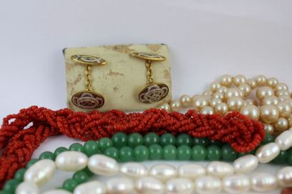 Lot of costume jewelry including: a gold...