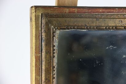 Carved gilded wood mirror. Dimensions : 44...