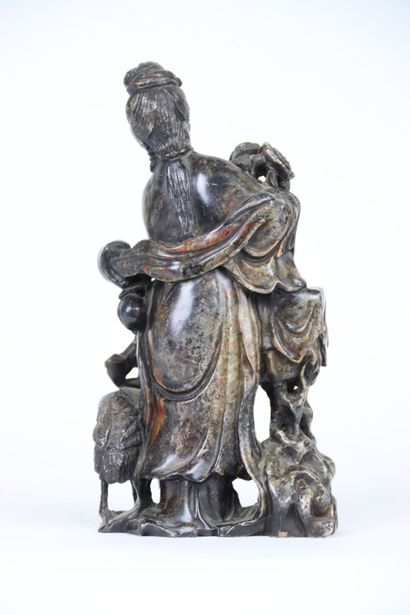 CHINA, statuette of Guanyin in hard stone....