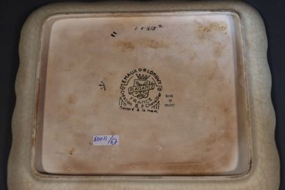 LONGWY. Dish in enamelled and cracked earthenware...