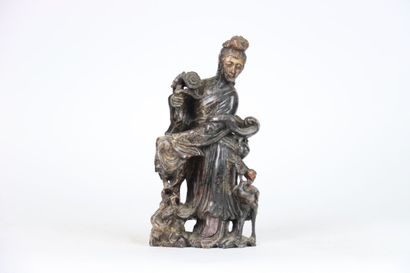 CHINA, statuette of Guanyin in hard stone....