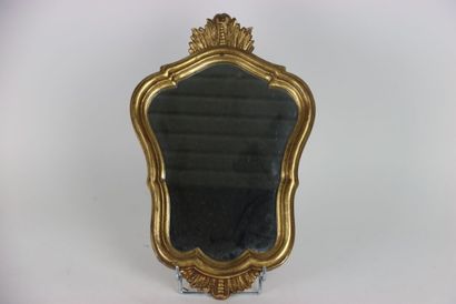 Small carved and gilded wood mirror with...