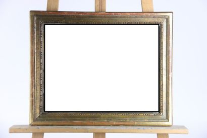 Carved gilded wood mirror. Dimensions : 44...
