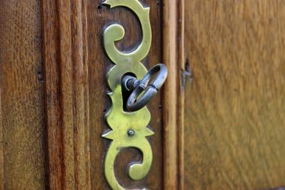 Buffet in molded and carved oak opening by...