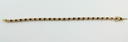 Bracelet en or jaune 18K (750/1000) orné...