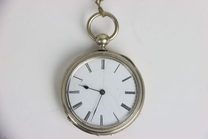 Pocket watch in metal with its key. Dial...