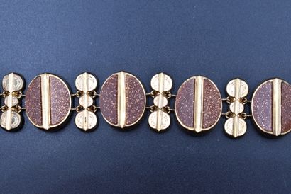 Bracelet en plaqué or à décor de sept médaillons...